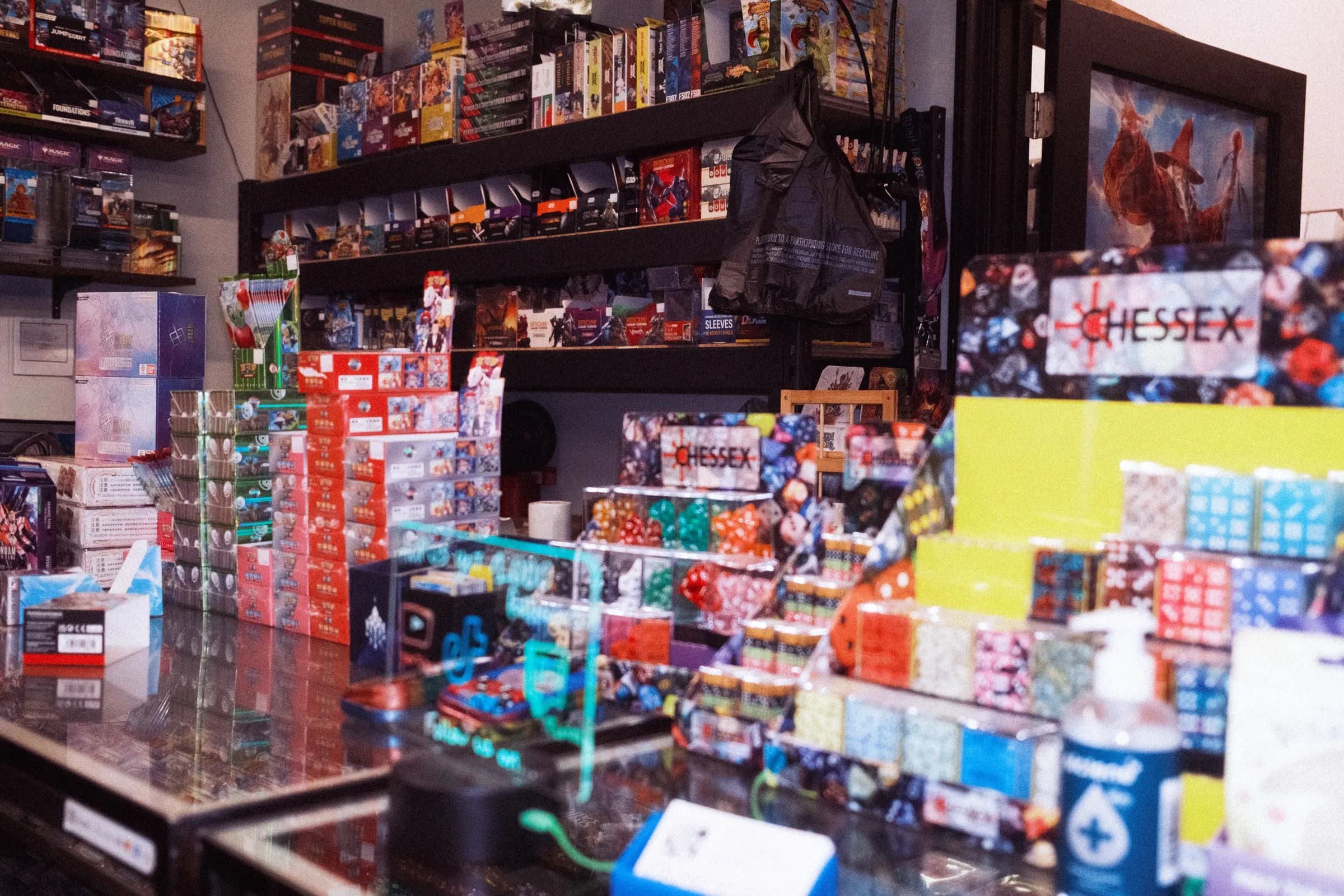 Inside Bulldog Community Gaming: the counter, booster displays and dice.